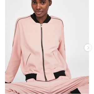 Zara women’s pink zip up & jogger set. Never worn